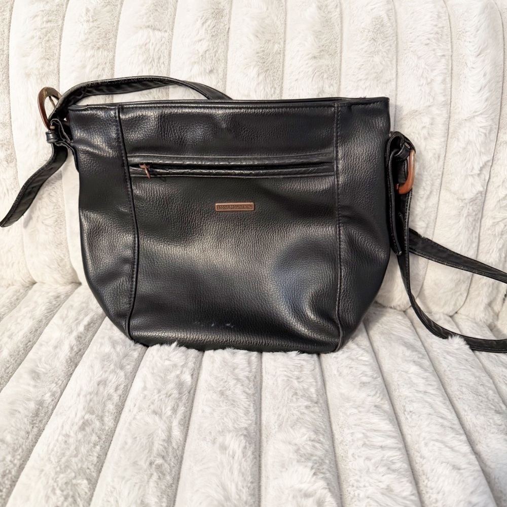 Stone Mountain vintage leather crossbody bag.
